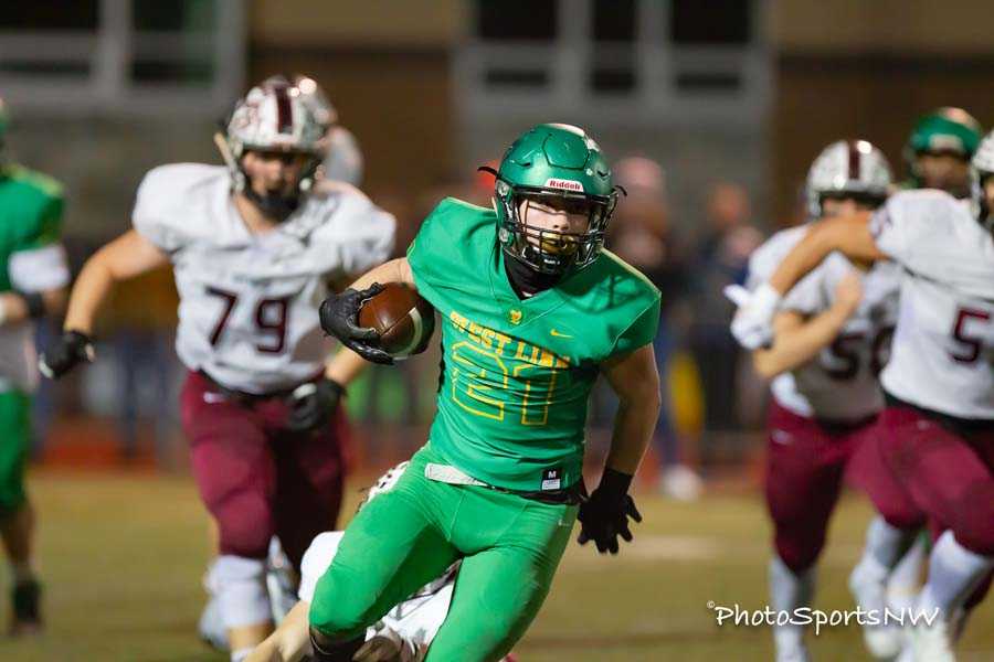 Gavin Haines ran wild for West Linn in its 21-point home win over Sherwood. Photo by Brad Cantor