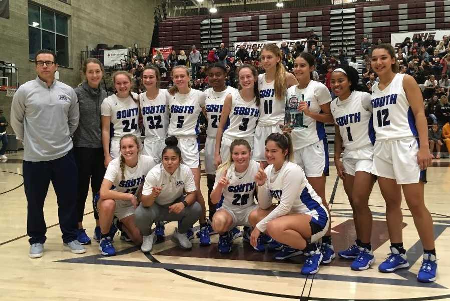 South Medford poses with its Diamond bracket trophy after beating Wilsonville on Sunday night.