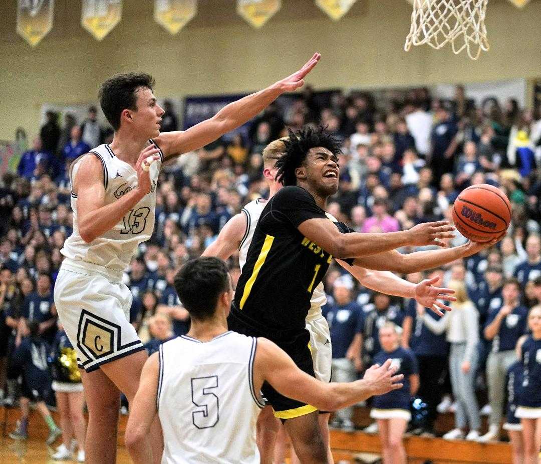 West Linn's Micah Garrett scored all 17 of his points in the second half Friday. (Photo by Jon Olson)