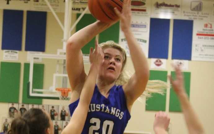 Riley Davis, a 6-foot-2 junior, scored 13 points in Crane's win Saturday. (John Braese/Eastern Oregon Sports Photos)