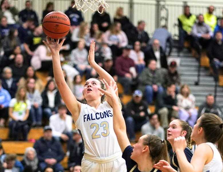 Liberty's Bella Hamel goes up for two of her team-high 13 points against Canby on Friday. (Photo by Jon Olson)