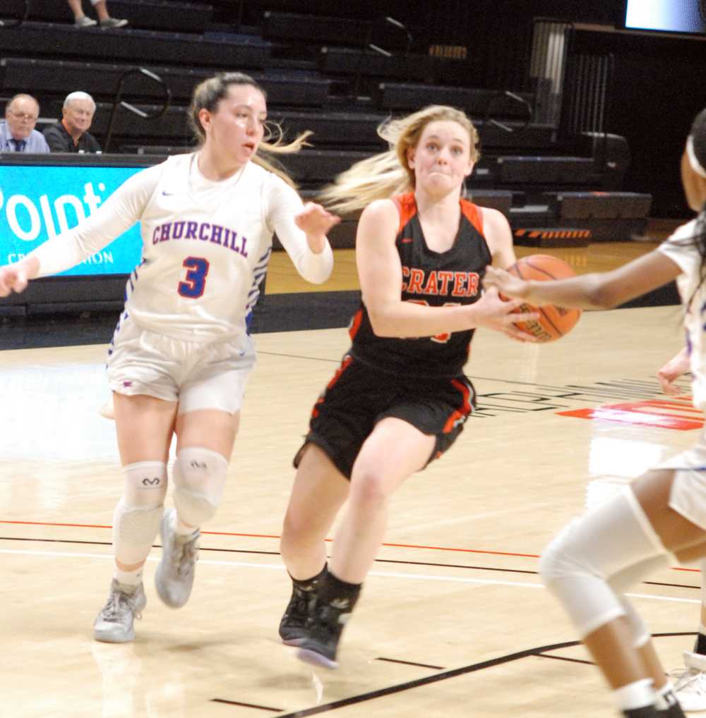 Allison Waters drives past Churchill's Sophie Elstone in the pivotal second quarter of Tuesday's game