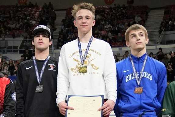 Crescent Valley's Chance Lamer (center) hopes to go for a fourth state title as a senior. (Photo by Jon Olson)