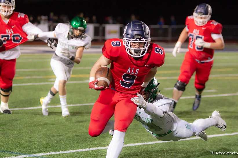 Lake Oswego's Casey Filkins ran for 169 yards against West Linn on Friday night. (Photo by Brad Cantor)