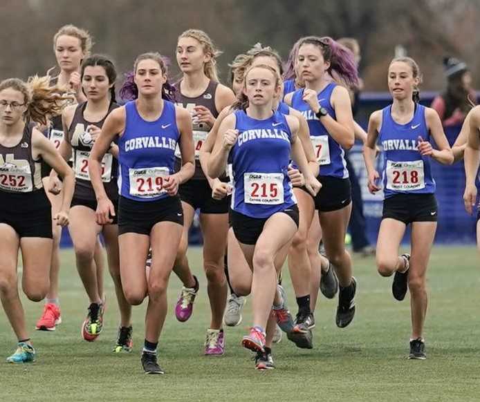 Madeline Nason (219) and Ava Betts (215) led the way for Corvallis at the 5A meet in 2019. (Photo by Jon Olson)