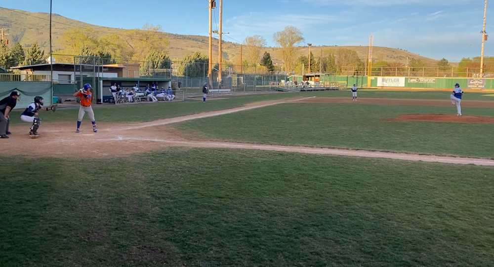 HIdden Valley's Nate Vidlak (at bat) had 5 hits in Game 1 of Monday's doubleheader, then hurled a complete game in the nightcap