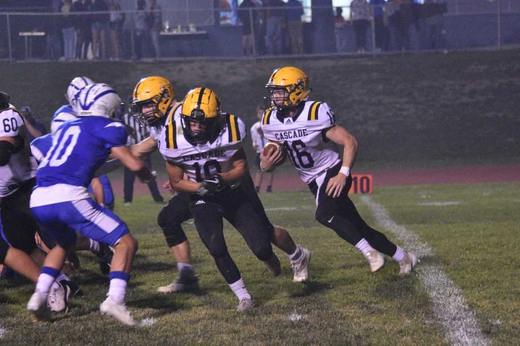 Cascade quarterback Jacob Hage (16) has rushed for 500 yards and seven touchdowns this season. (Photo courtesy Cascade HS)