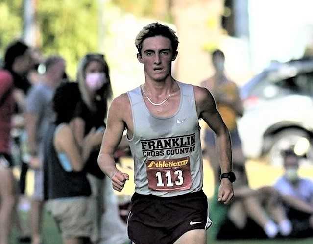 Franklin's Charlie North ran a lifetime best in winning the Lewis & Clark Invitational on Saturday. (Photo by Jon Olson)