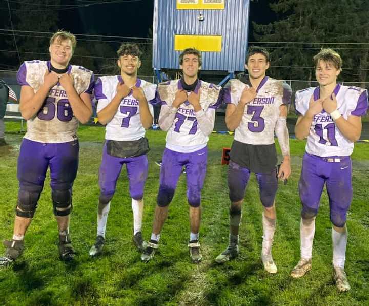 Jefferson's Cody Jurgens (56), Jace Aguilar (7), Jameson Bender (77), Zach Wusstig (3) and Trevor Withee (11)after Friday's win.