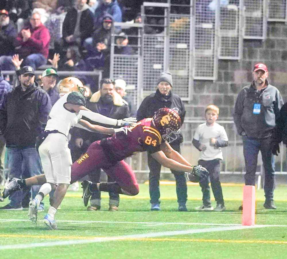 Riley Williams beats Jace Burton to the pylon to score in the third quarter for Central, his second TD of the game. (Jon Olson)