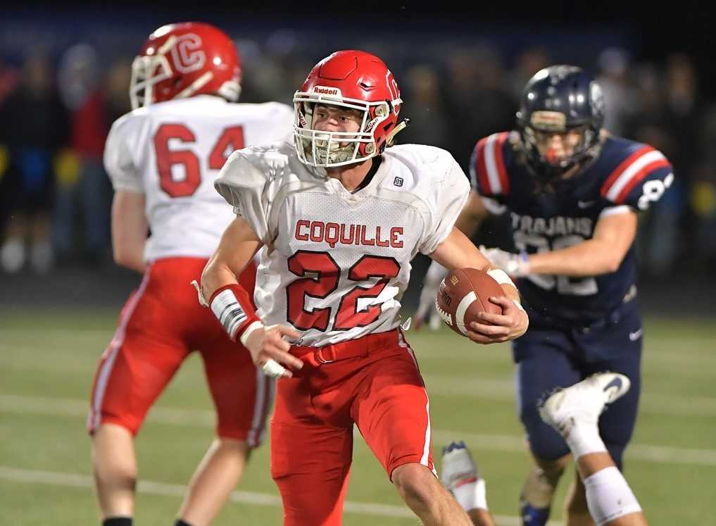 Coquille senior Gunner Yates ran for touchdowns of 55, 26, 74, 61 and 48 yards Saturday. (Photo by Andre Panse)