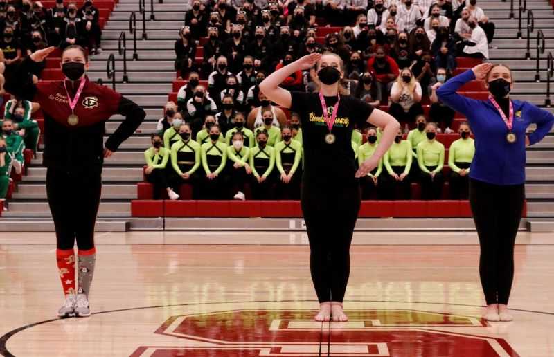 Advanced Drill Down: Wentworth, Middleton and Seet salute the audience following the competition. (Photo by Chantel Kaaihue)