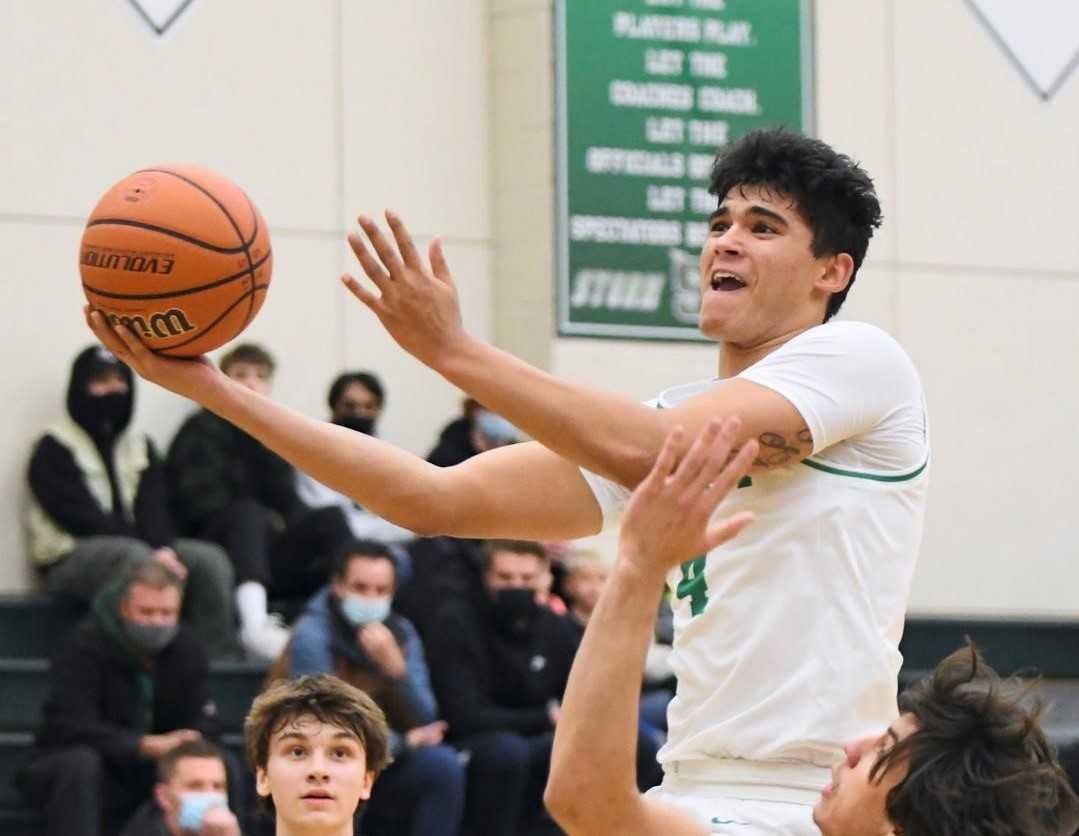 Caden Harris, a 6-foot-6 senior wing, leads Summit in scoring (18.8) and rebounding (5.8). (Photo by Kris Cavin)