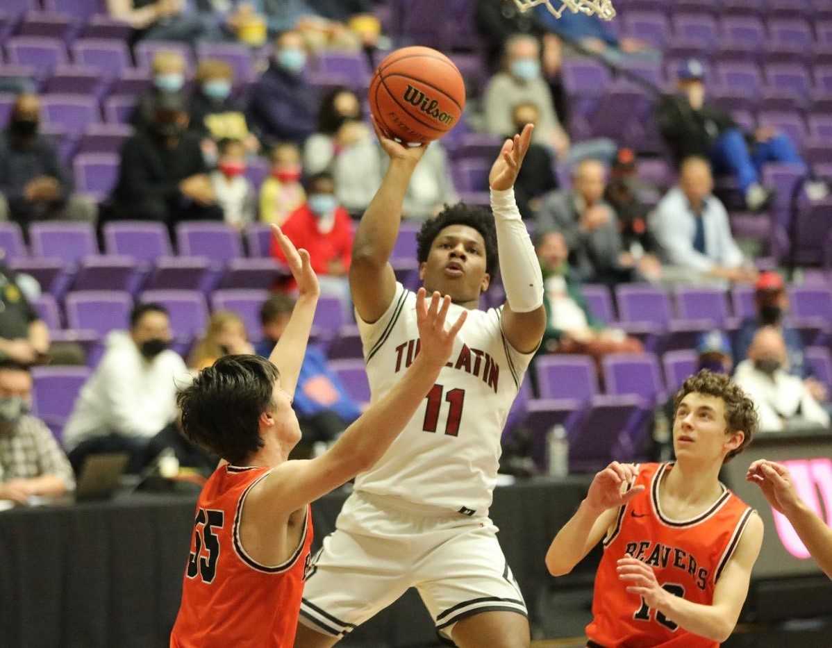 Tualatin's Malik Ross scored a game-high 22 points in his team's quarterfinal win over Beaverton. (Photo by Norm Maves Jr.)