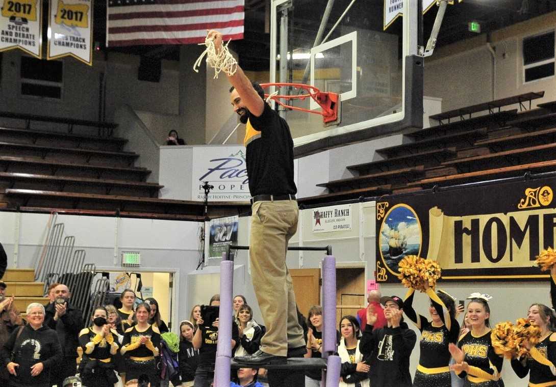 Philomath coach Ben Silva celebrates after his team won the 4A title by beating Corbett. (John Gunther/The World)