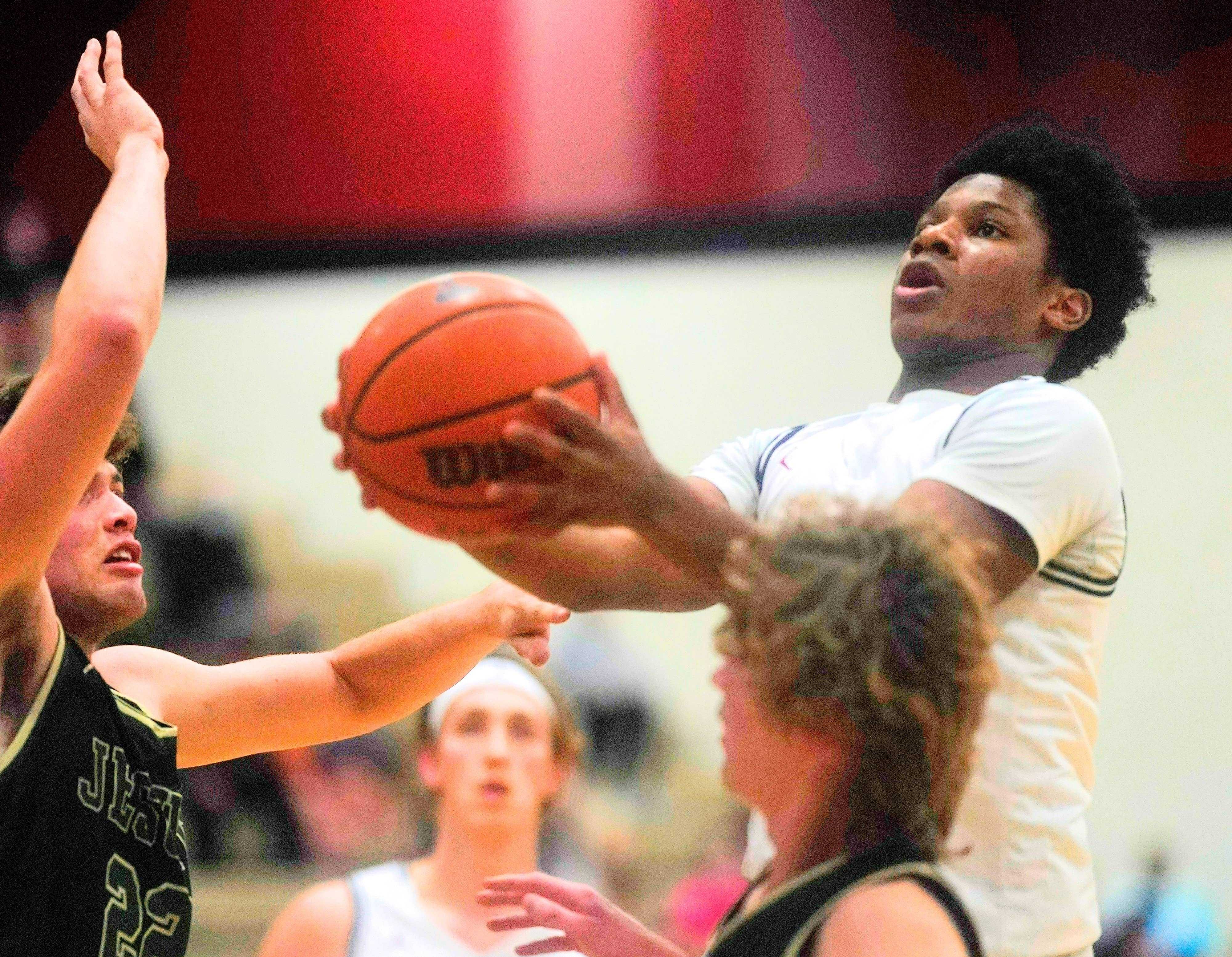 Point guard Malik Ross averaged 13.0 points per game for 6A champion Tualatin last season. (Photo by Jon Olson)