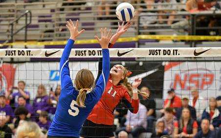 Kennedy's Sophia Carley attacks against Glide in the 2A quarterfinals. (Photo by Andre Panse)