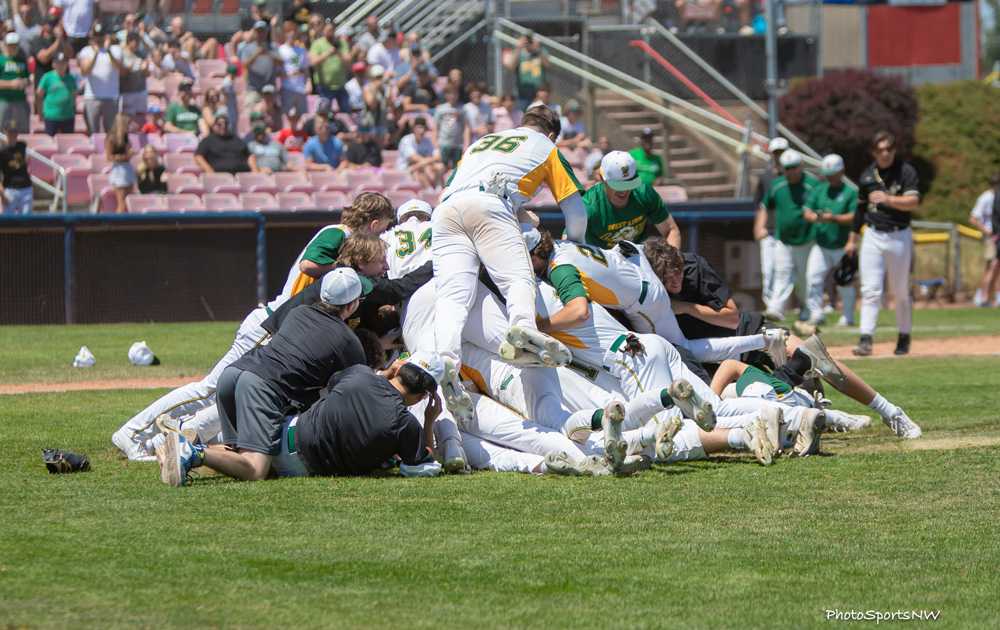Ever see Lions in a dogpile? It happened in Keizer when West Linn won 6A on Saturday. (Brad Cantor/PhotosportsNW)