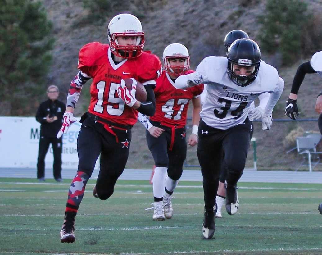 Dufur's Tanner Masterson ran for four touchdowns and caught a scoring pass Saturday. (Photo by Robert Wallace)