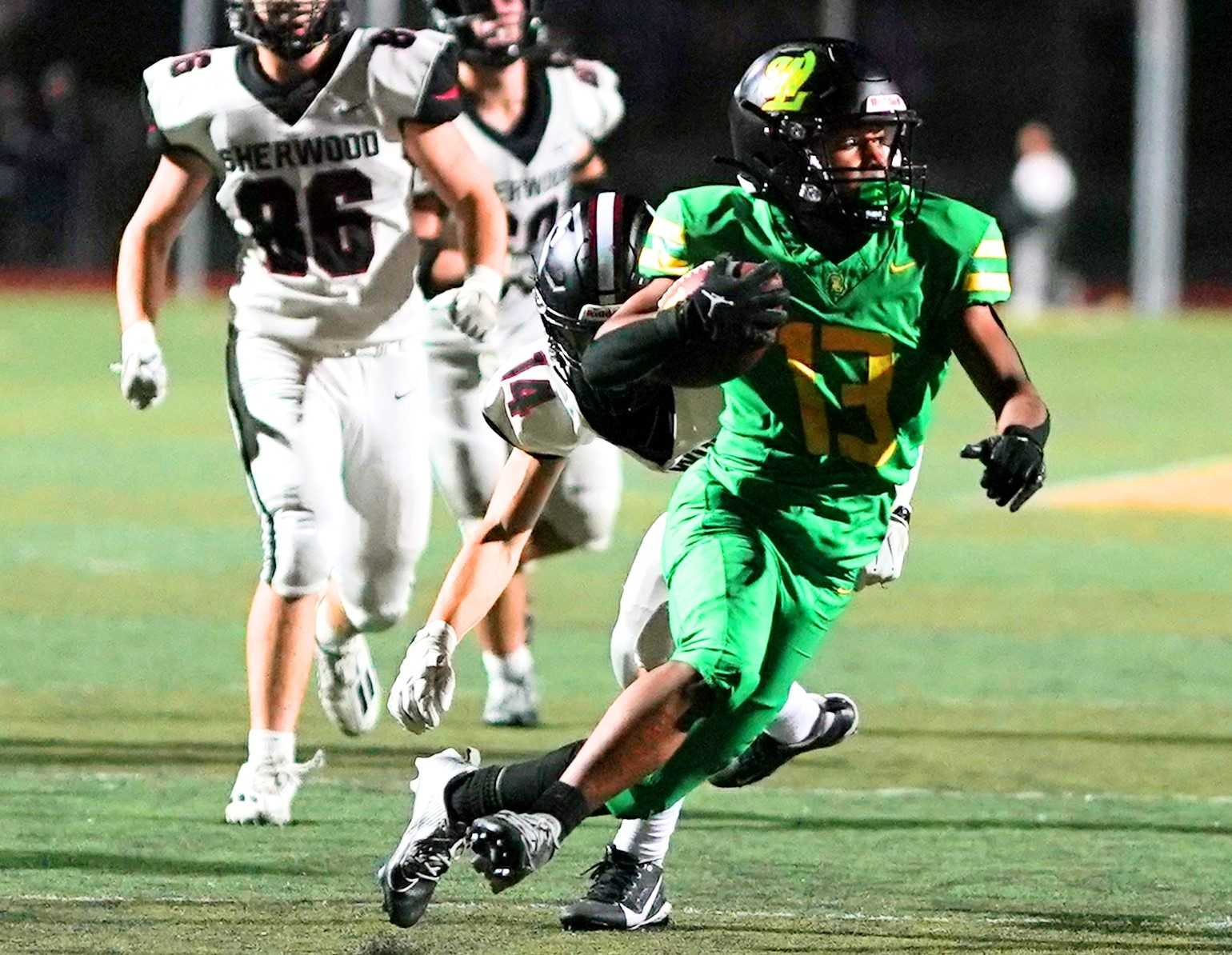 West Linn junior Viggo Anderson darted in and out of Sherwood's defense Friday in a 35-0 victory. (Photo by J.R. Olson)