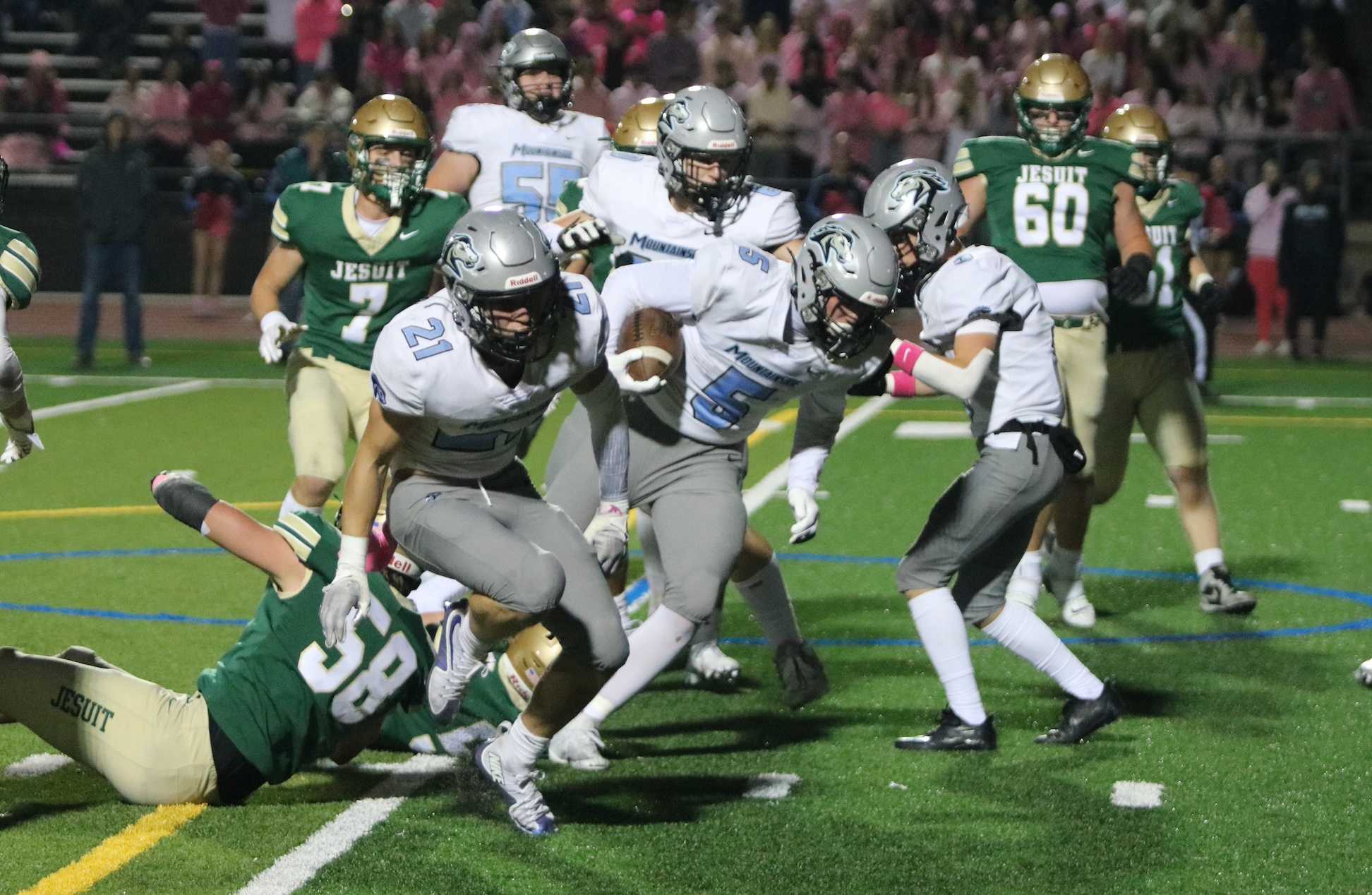 Mountainside's Sam Vyhlidal had six carries for 27 yards and two TDs in Friday's 58-35 road win over Jesuit. (Jim Beseda photo)