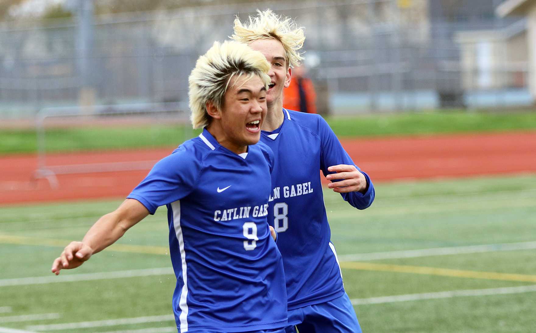 Catlin Gabel senior Leon Liu (9) celebrates after scoring against OES in Saturday's state title match (photo by Dan Brood).