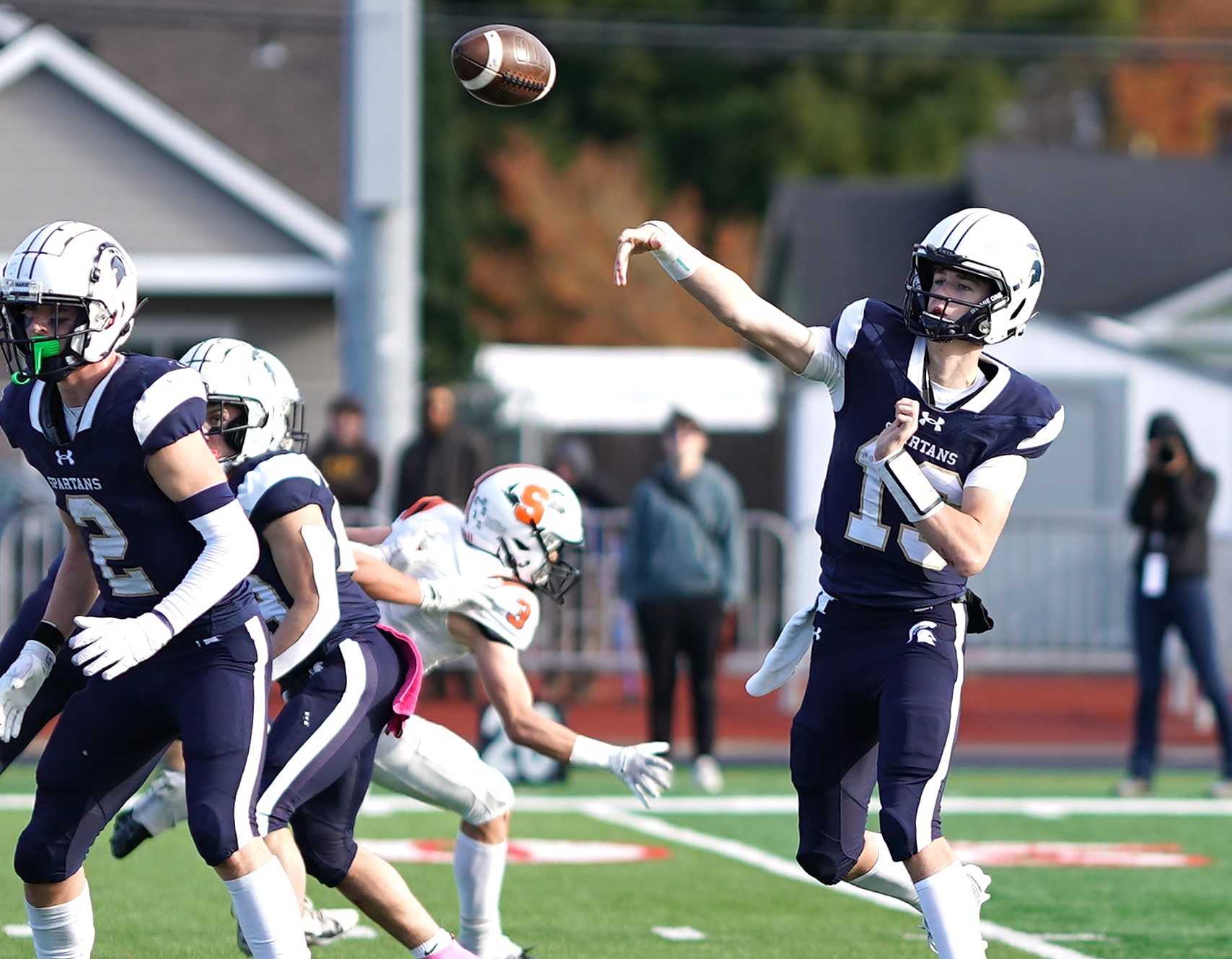 Nick Hudson passed for 306 yards and four touchdowns in Marist Catholic's semfinal win Saturday. (Photo by J.R. Olson)