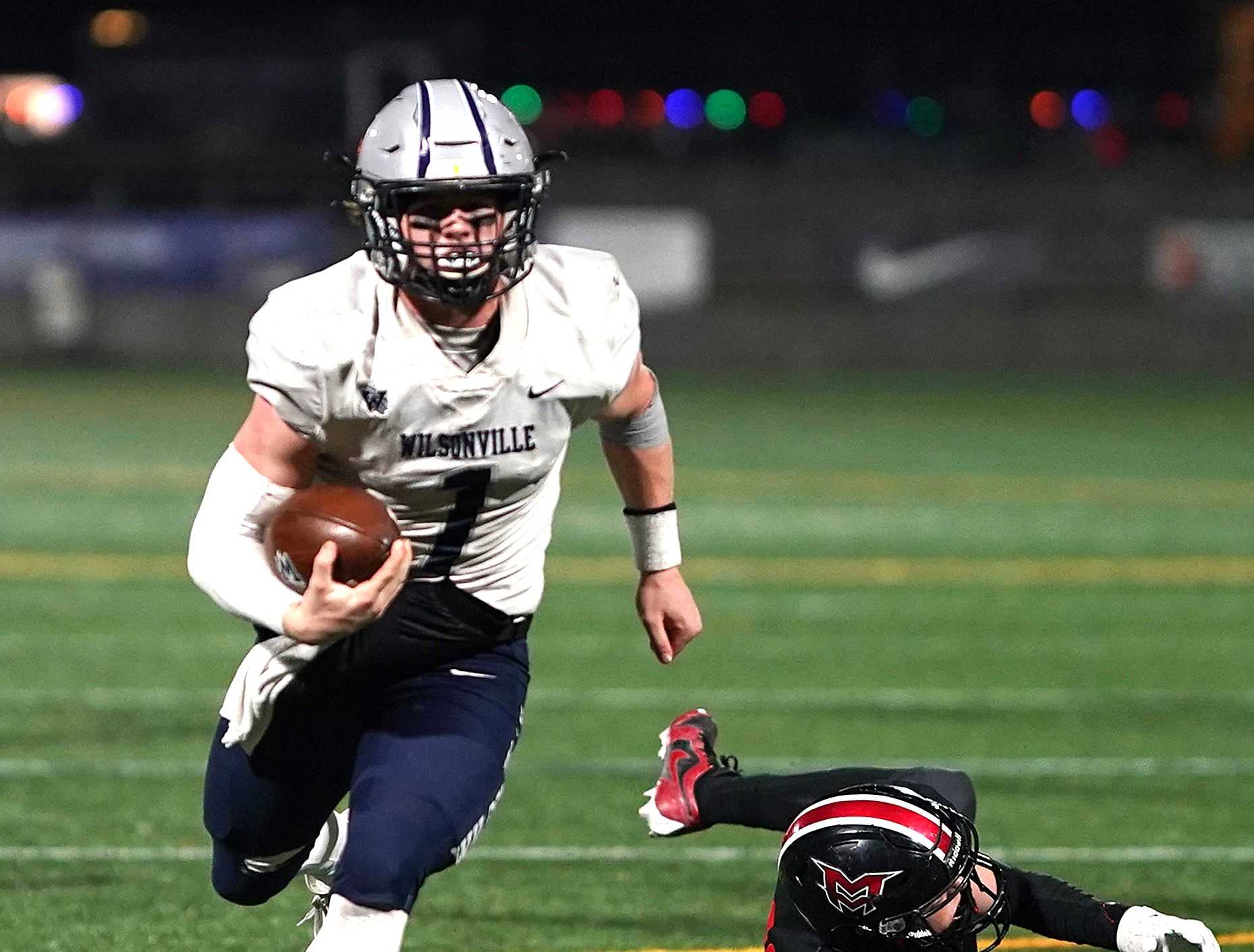 Wilsonville senior Mark Wiepert ran for five touchdowns and passed for three scores in Friday's win.(Photo by J.R. Olson)