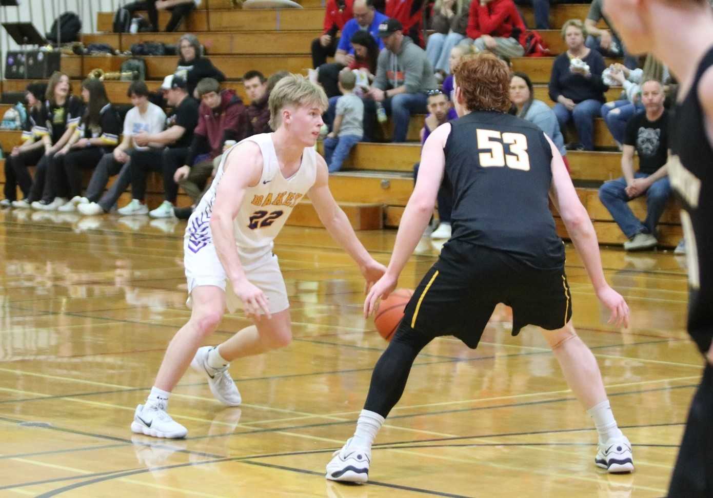 Baker's Jaxon Logsdon (22) made eight three-pointers in three games at the Central Oregon Tip-Off Classic. (Photo by Jim Beseda)