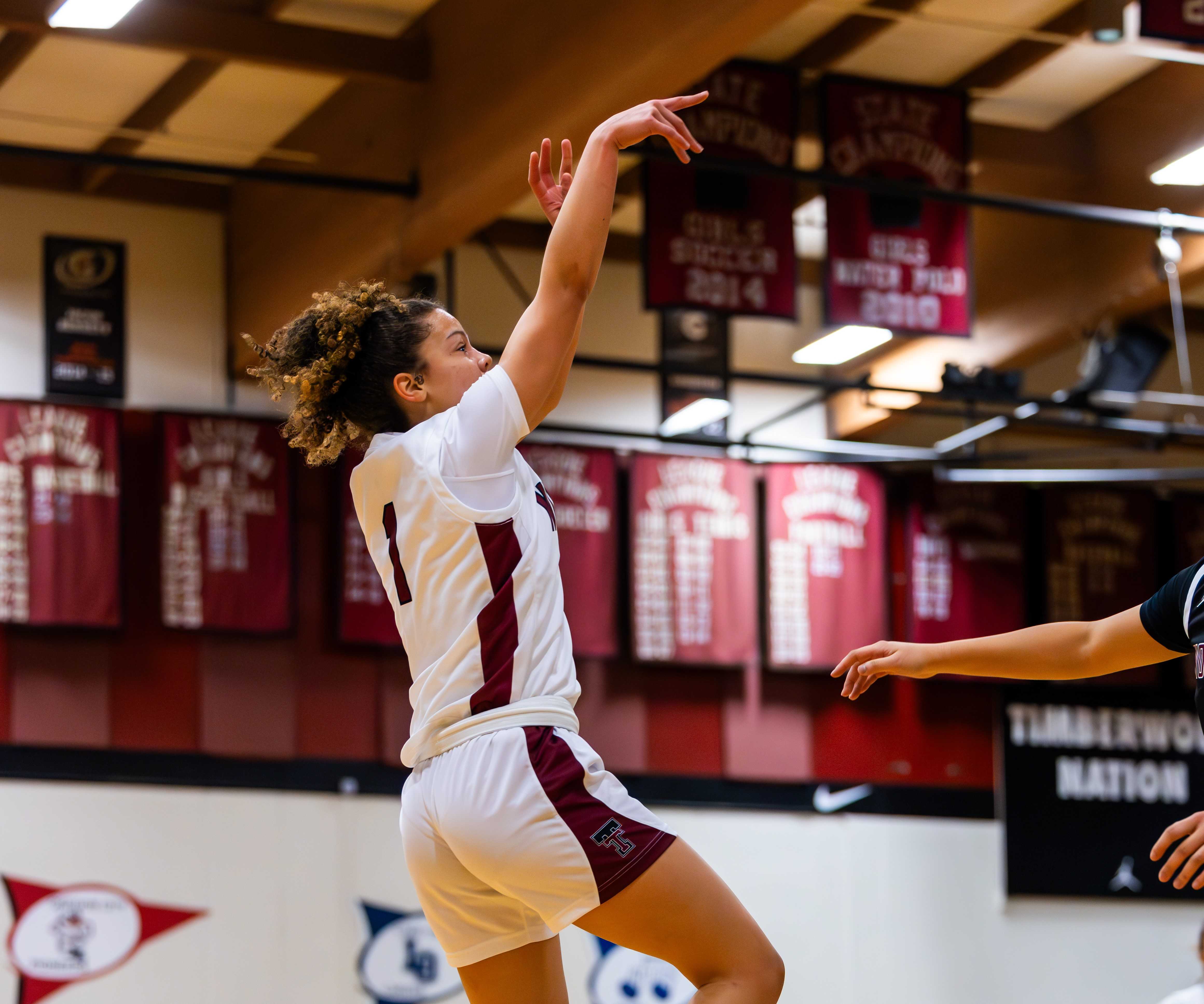 Freshman point guard Love Lei Best leads Tualatin in scoring at 16.3 points per game. (Photo by Mac Thomson)