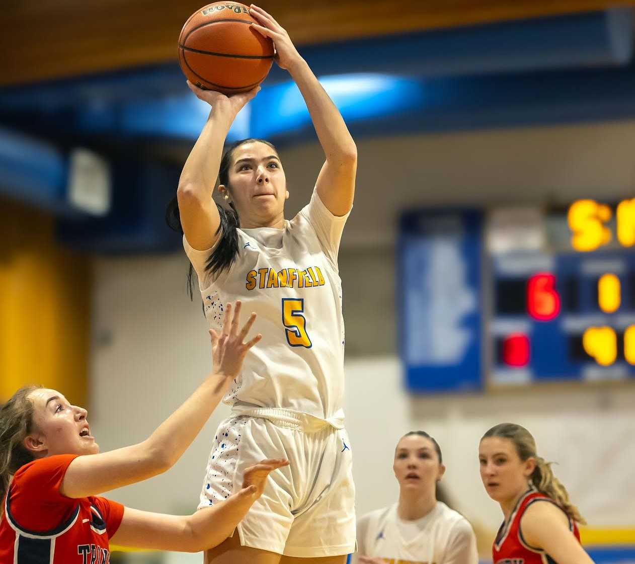 Stanfield's Mazie Reeser goes up for a shot against Trinity Lutheran in a 2A playoff game Feb. 28. (Photo by Kathy Aney)