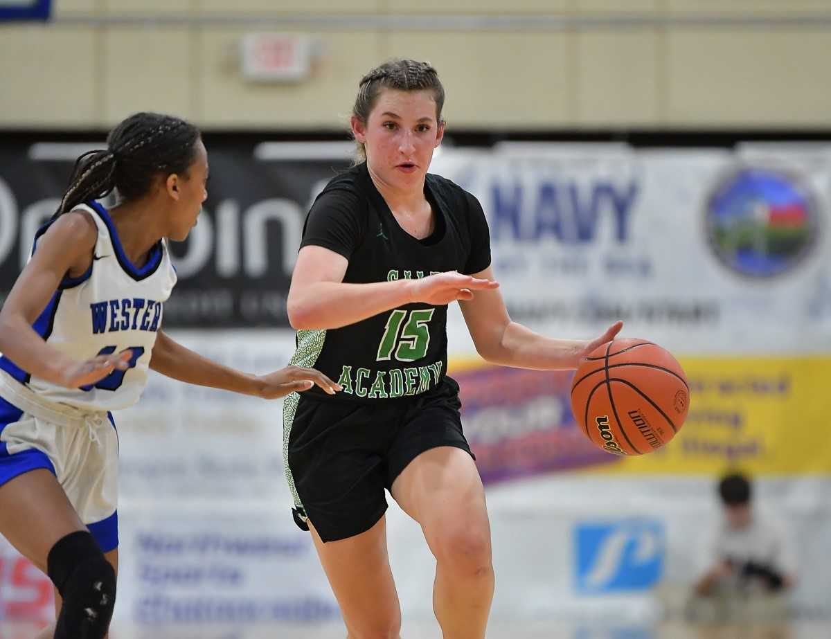 Salem Academy's Celia James works the ball up the court against Western Christian on Saturday night. (Photo by Andre Panse)