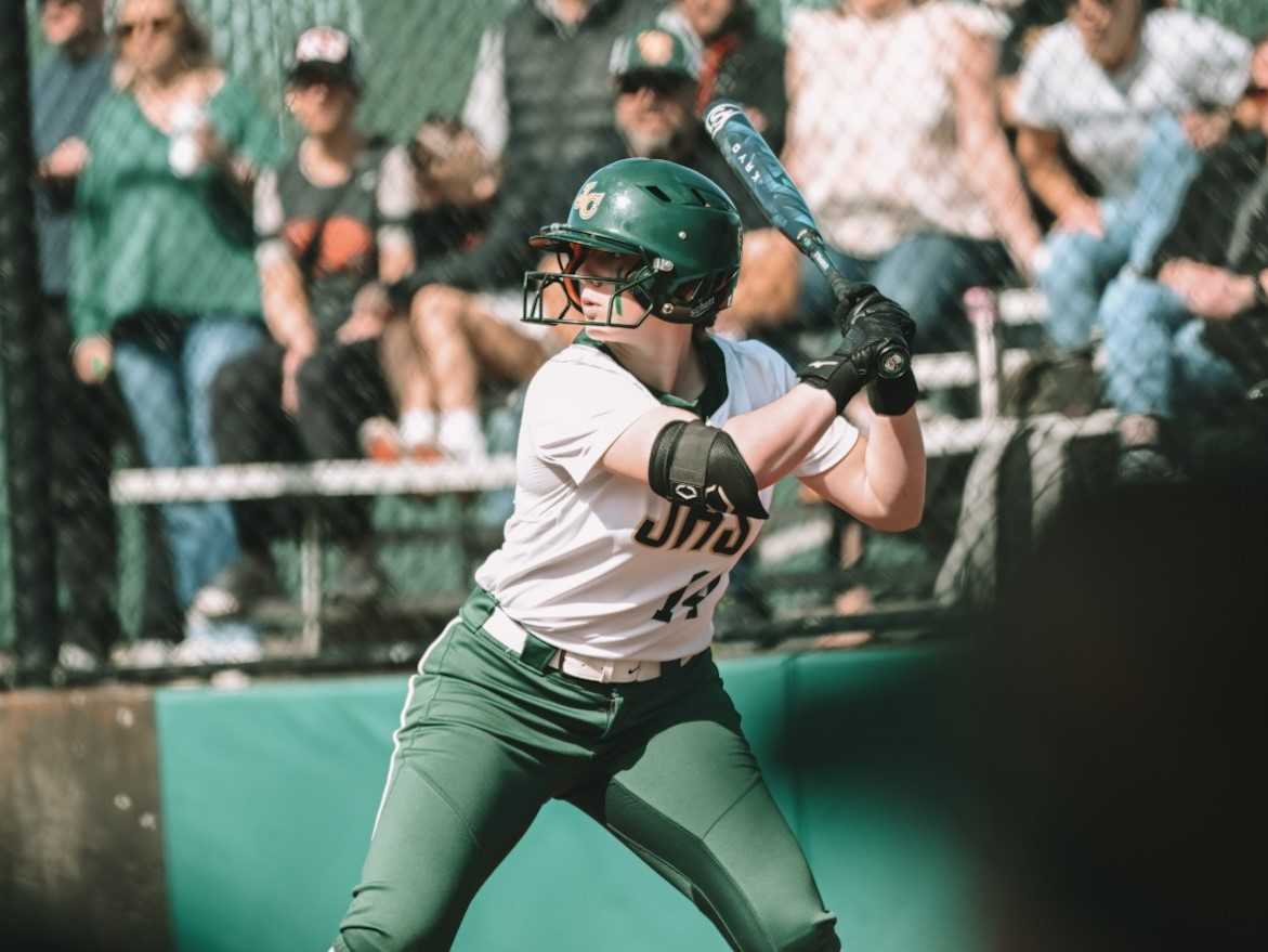 Freshman Liz Jacobs is batting a team-high .625 for Jesuit, which has won its first seven games. (Photo by Carlos Regnier)