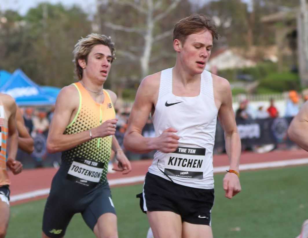 Crater's Josiah Tostenson (left) and Tayvon Kitchen (right) jockey for position during the 1,500 at The Ten. (West Coast XC)