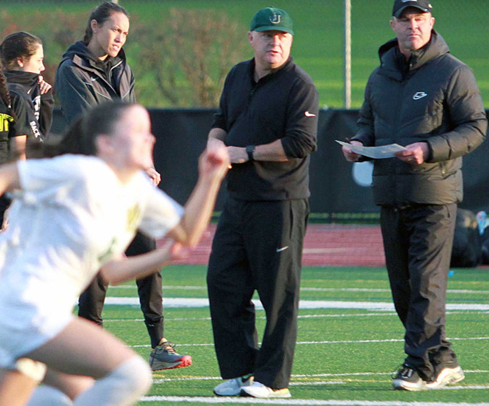 Steve Fennah (center) began coaching at Jesuit in 1993, one year after moving to the US from Wales. (Photo by Miles Vance)