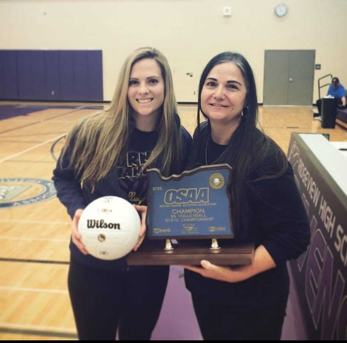 Courtney, left, and Paul Toney pose with the 2015 3A state title won by Burns. (Courtesy photo: Courtney Toney)