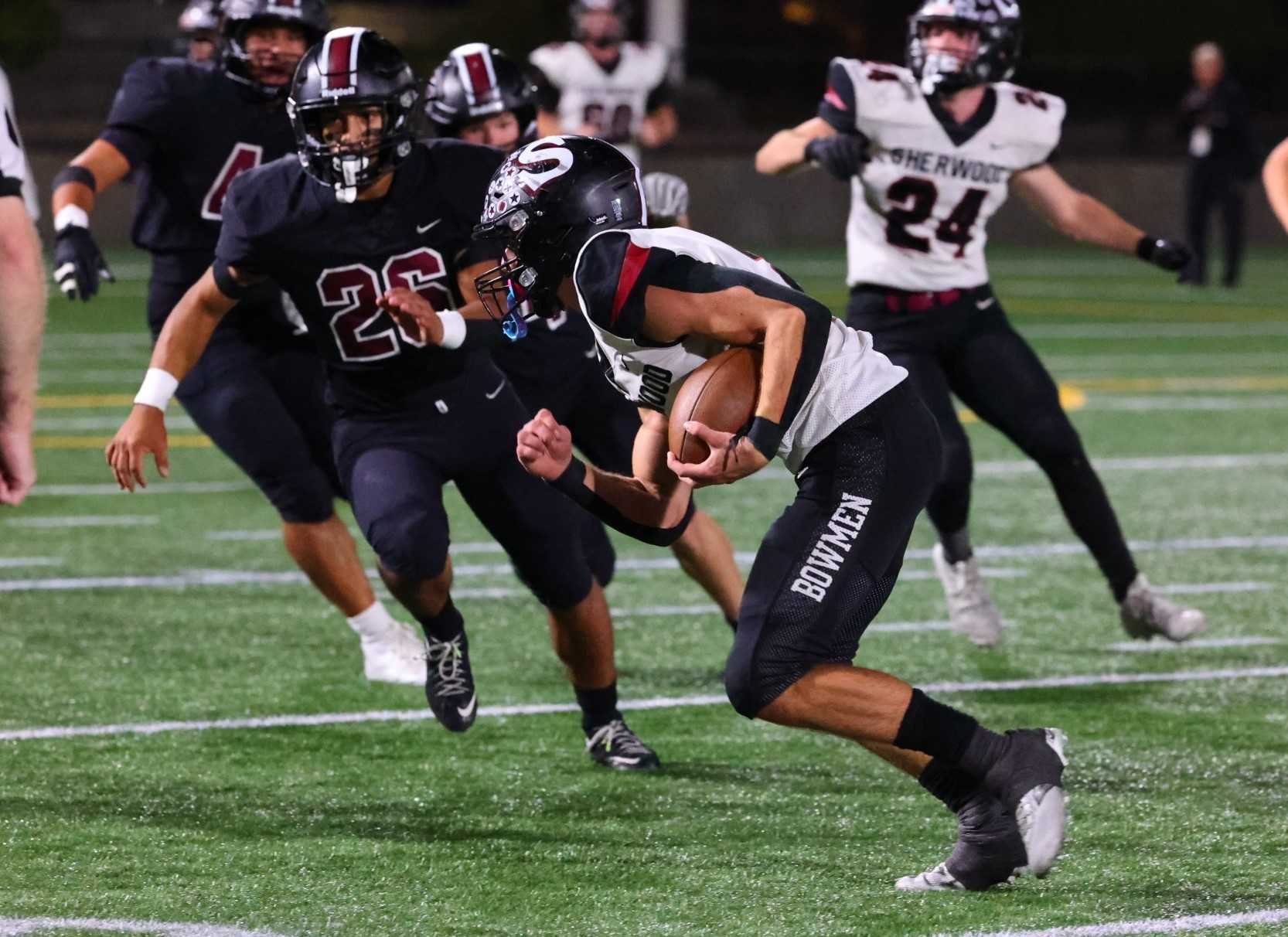 Sherwood's Jack Wilson returns an interception to set up his team's game-winning field goal Friday.(KatieKarl_sportsphotography)