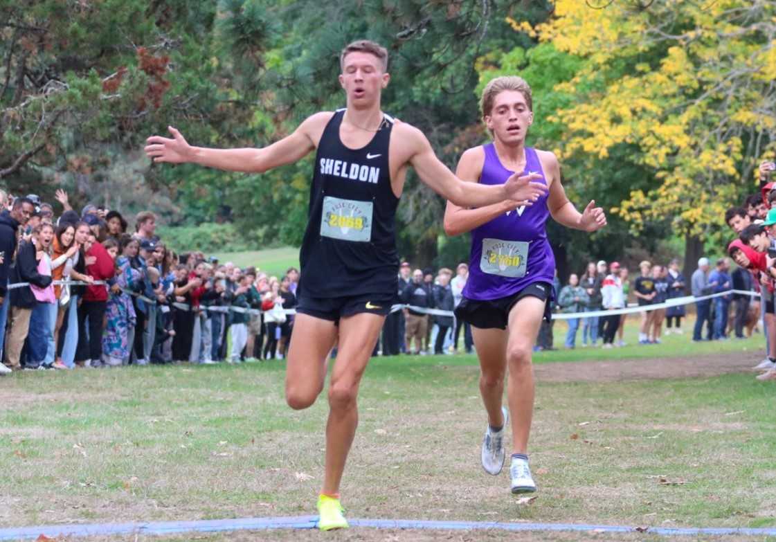 Sheldon's Malachi Schoenherr edged Warrenton's Jayden Warner by .17 seconds at Rose City Golf Course. (WestCoastXC)