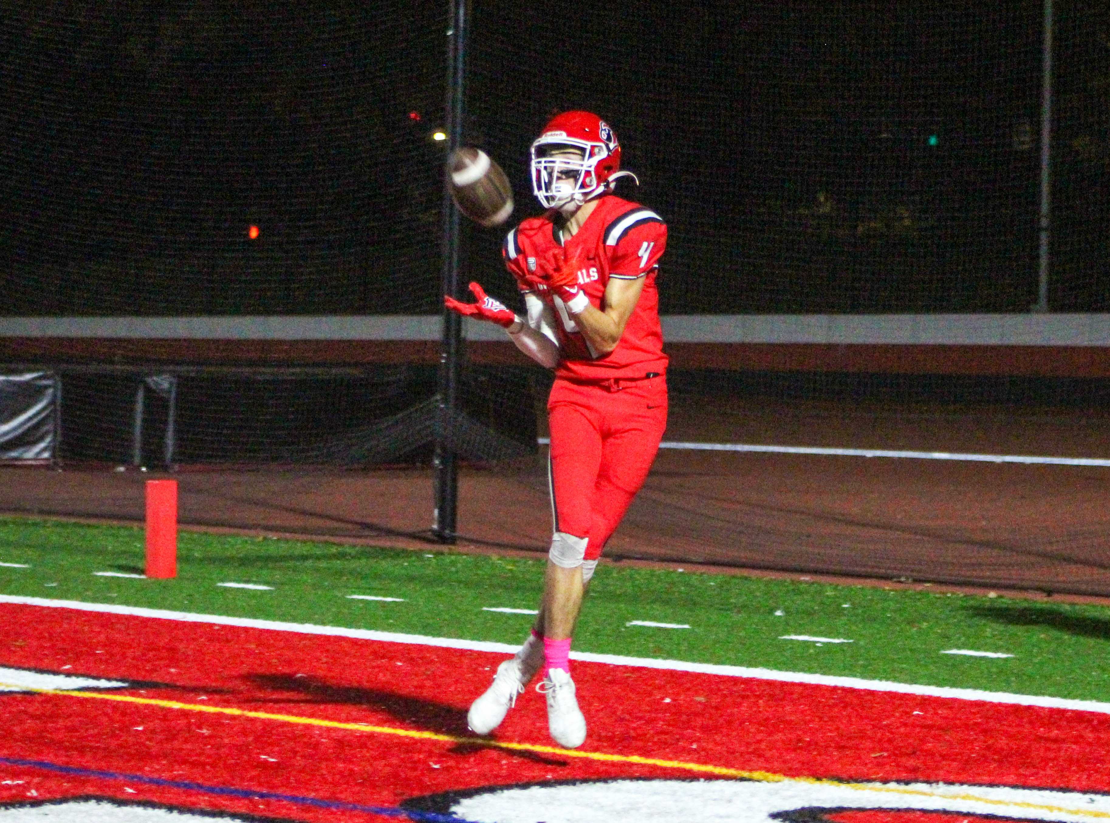 Lincoln's Reed Eldridge makes a TD grab against Ida B. Wells. (Photo by Austin White/Portland Preps)