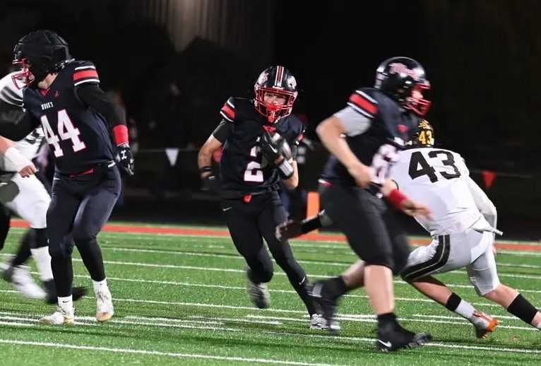 Tillamook's Griffyn Boomer (2) scored four touchdowns in a first-round playoff win over North Bend. (Photo by Matt Dickson)