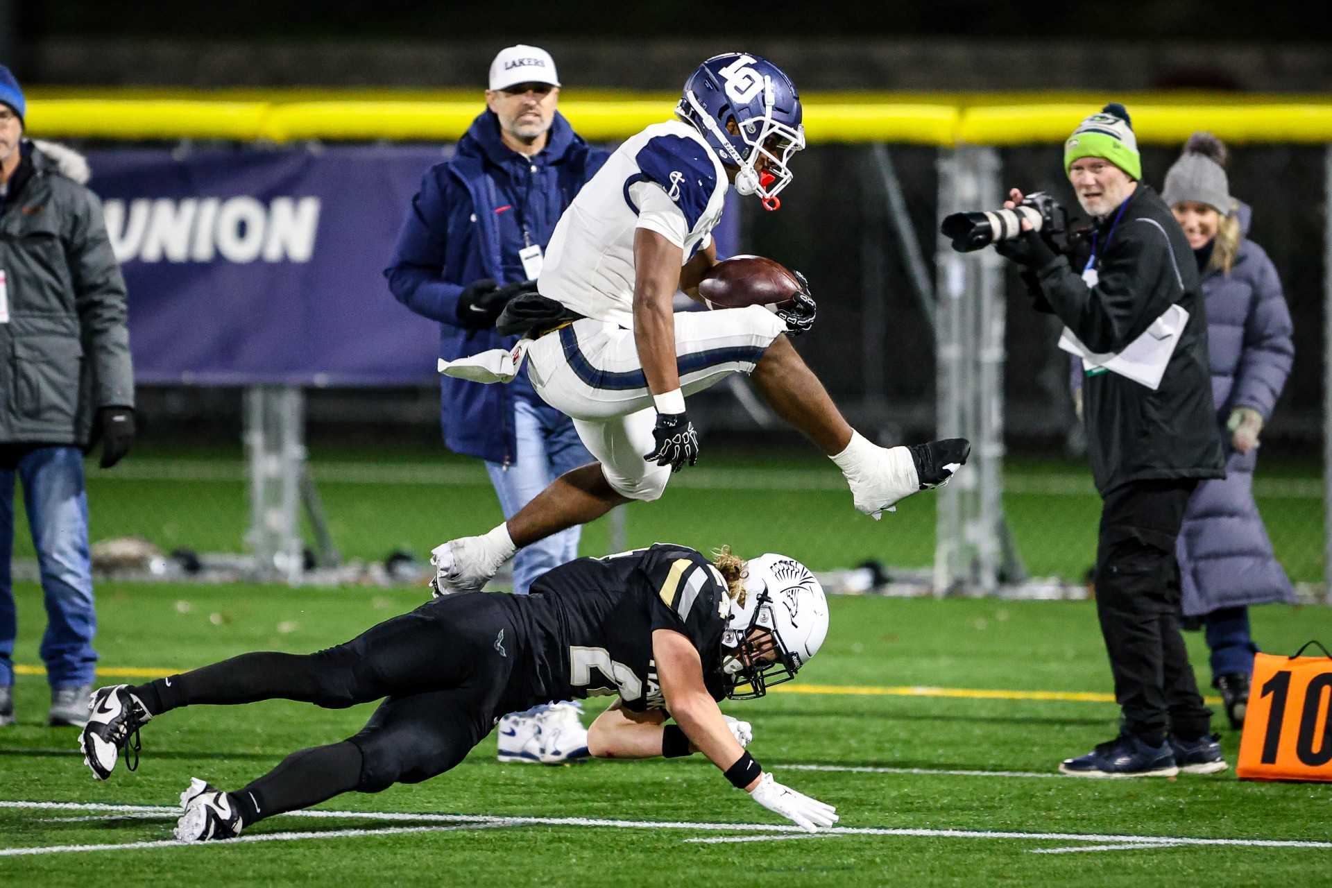 Lake Oswego's LaMarcus Bell rushed for 156 yards and three touchdowns in Friday's semifinal win. (Photo by Ryan Fanger)