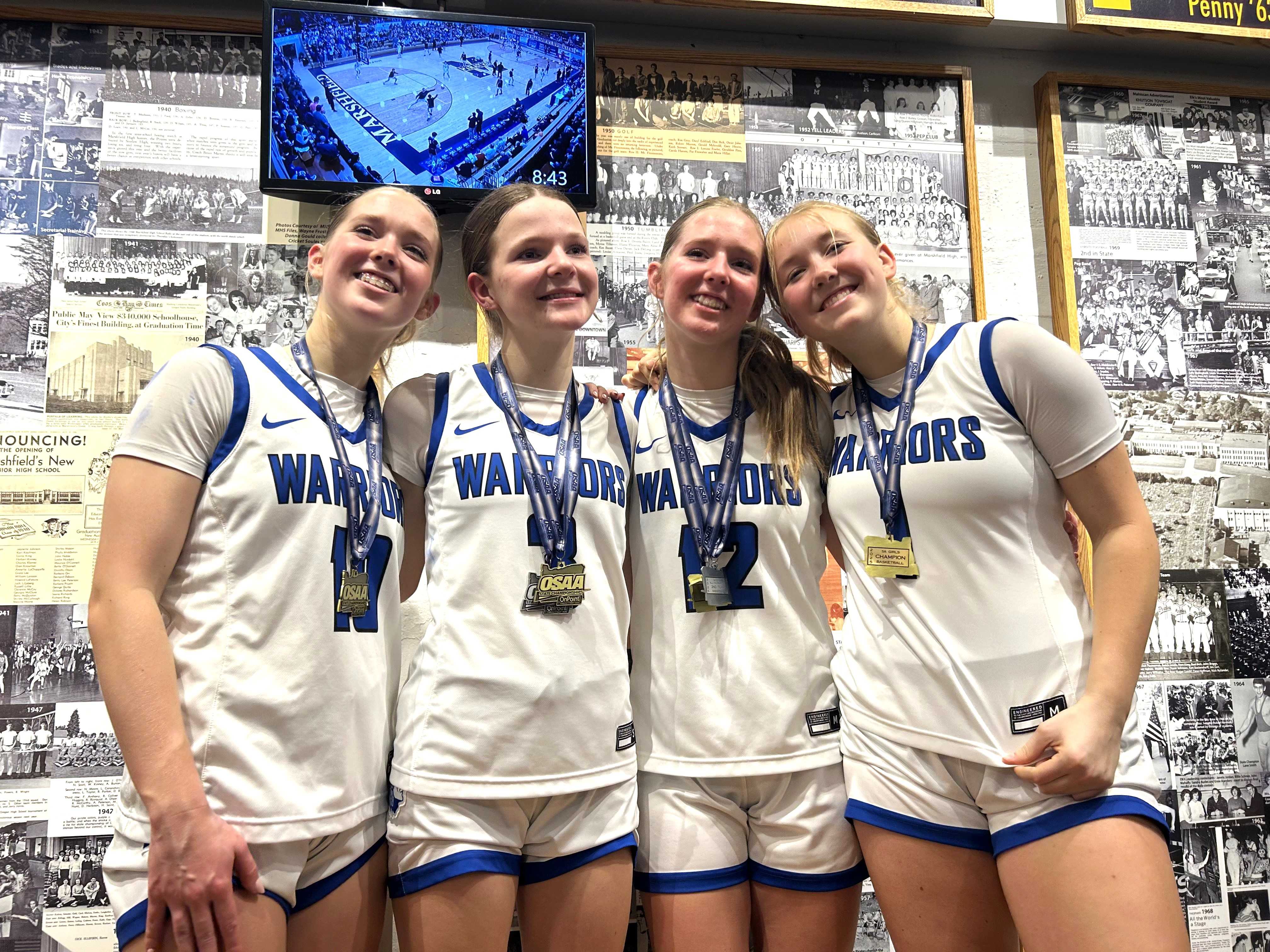 Amity seniors (from left) Adie Nisly, Alyssa McMullen, Eliza Nisly and Kylie Wilson have excelled together since kindergarten.