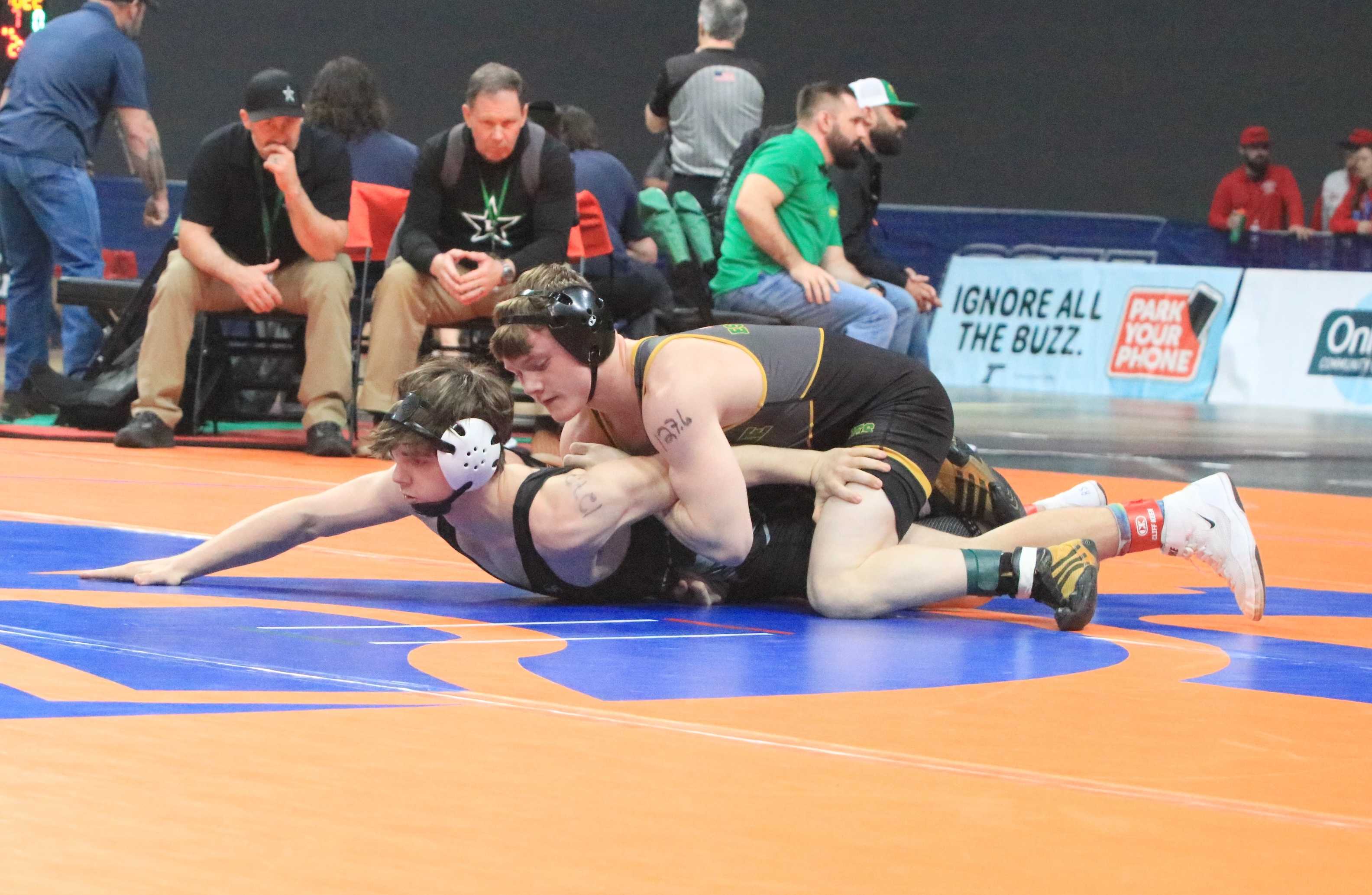 Sweet Home's Jesse Landtroop (top) won by fall over Estacada's Ryder Svela in Thursday's 4A boys wrestling state tournament.