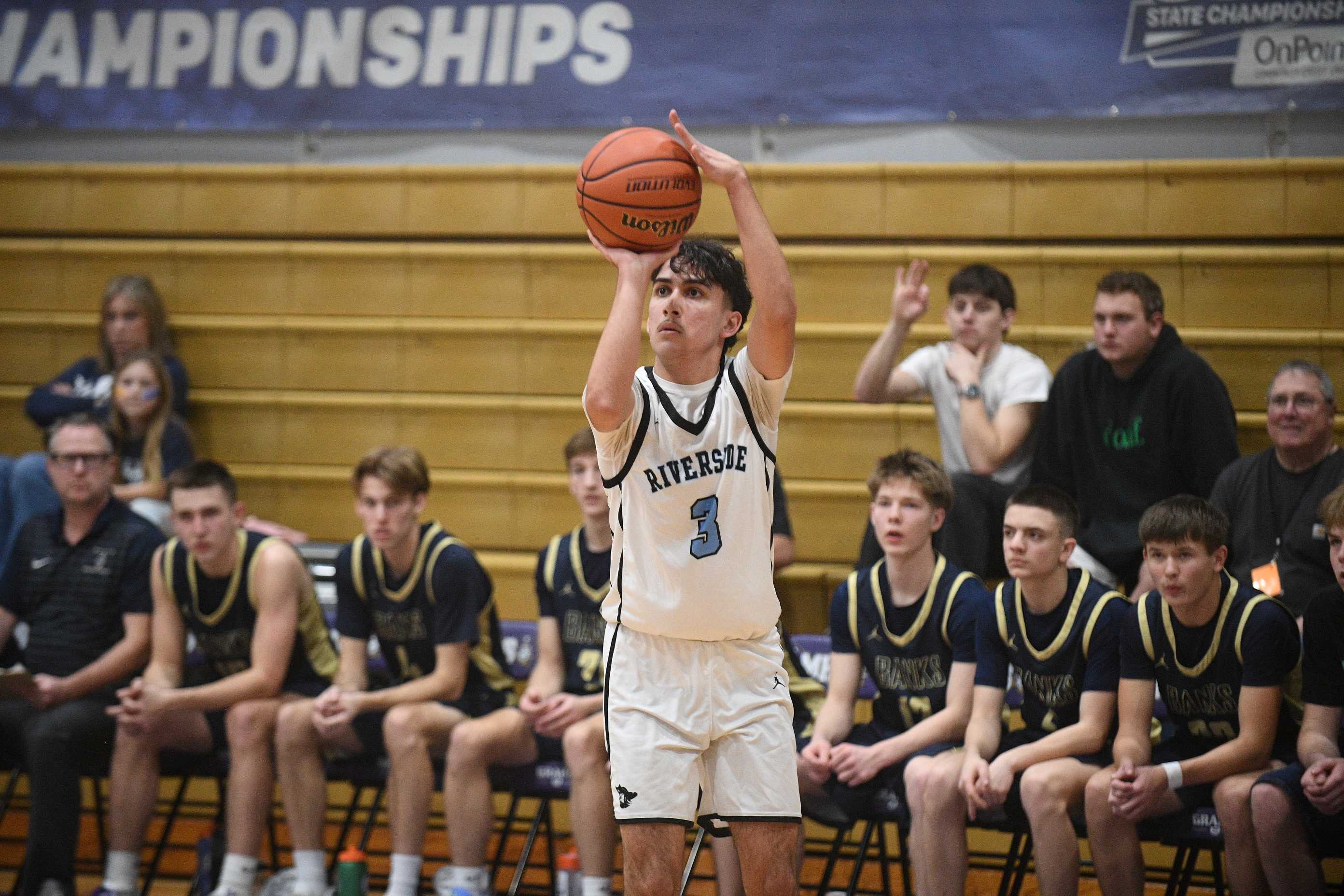 Riverside's Jesus Pena hits a 3-pointer against Banks on Friday (John Gunther photo).