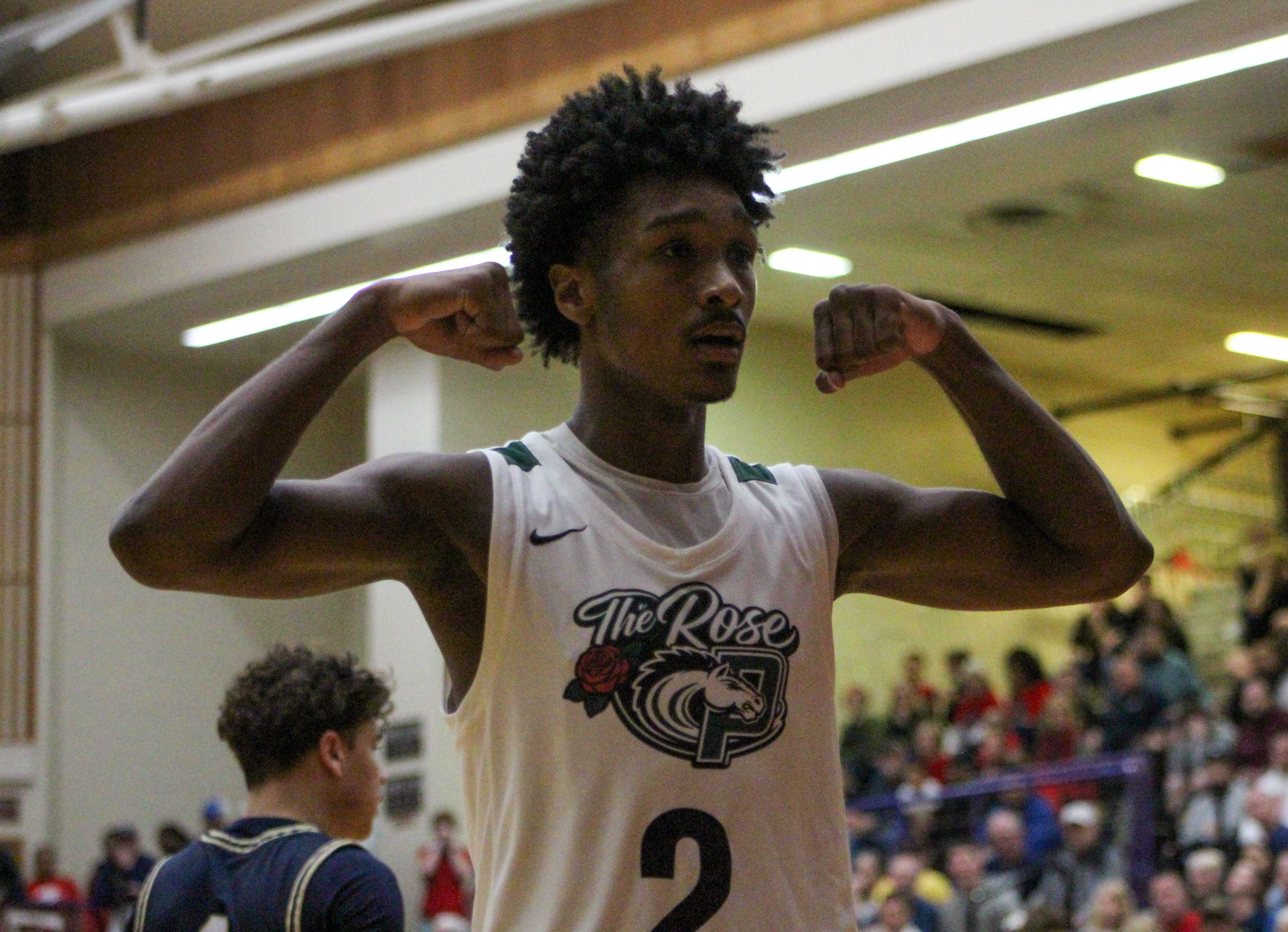 Parkrose senior Fuzzy Montague flexes after sealing the win over Canby. (Photo by Austin White)