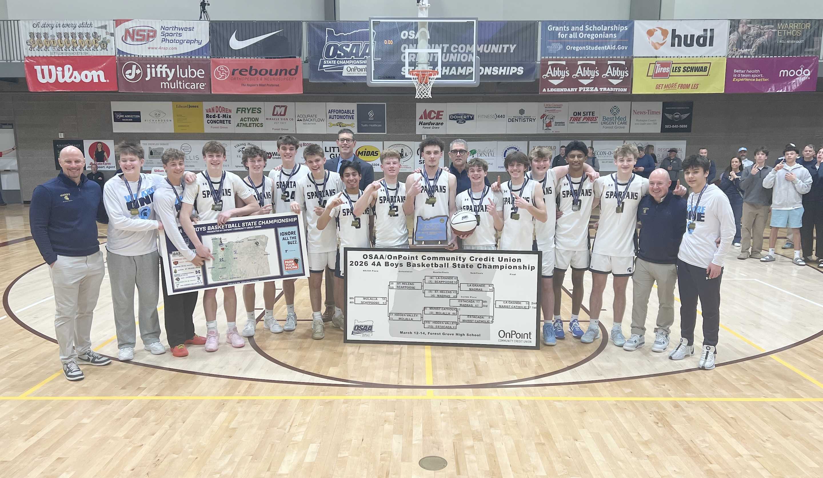 Marist Catholic downed La Grande 57-55 to clinch the 4A boys basketball state championship Saturday at Forest Grove High School.