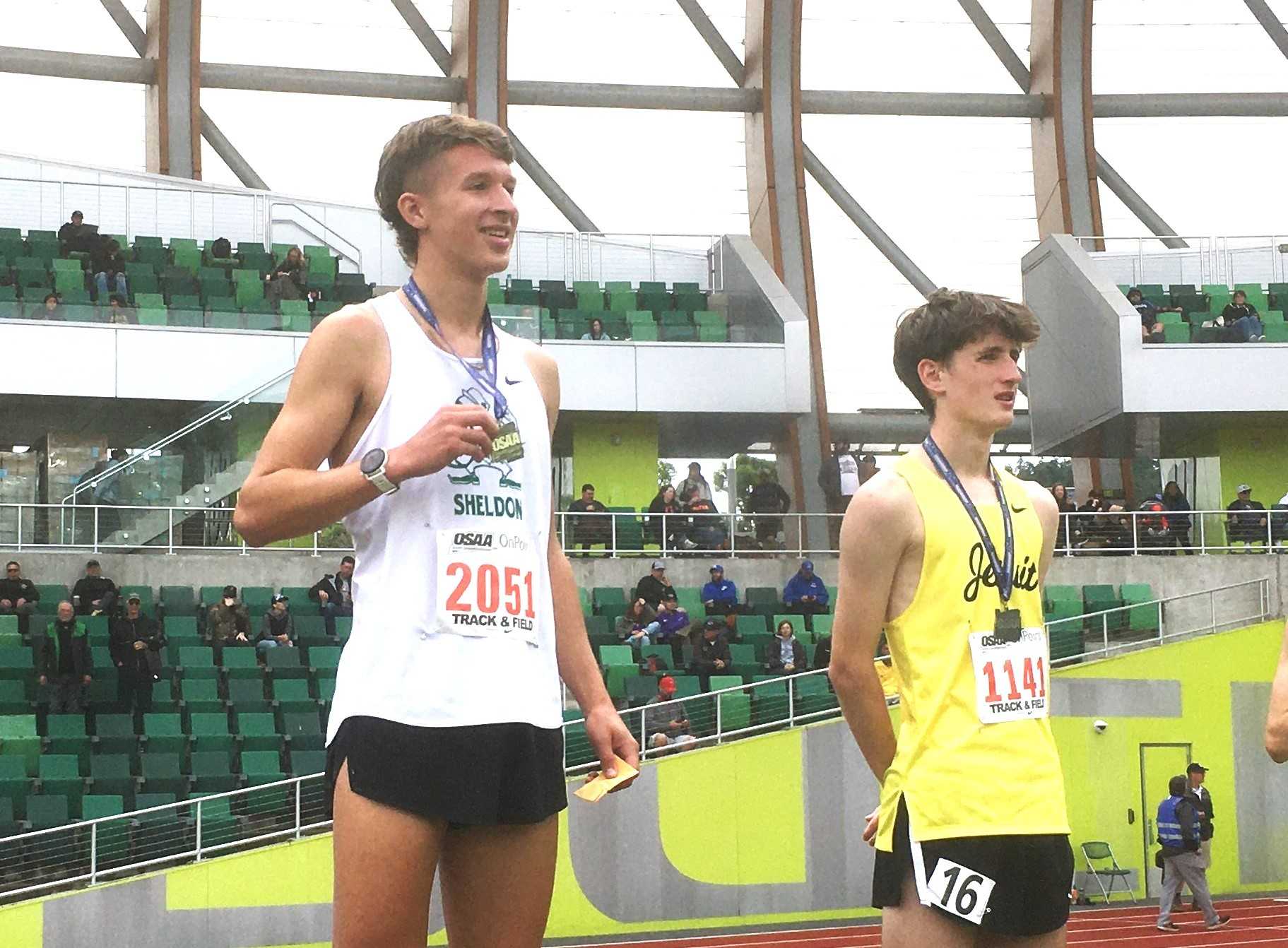 Sheldon senior Malachi Schoenherr (left) held off Jesuit's Kellen Williams (right) to win the 6A 3,000 meters Friday.