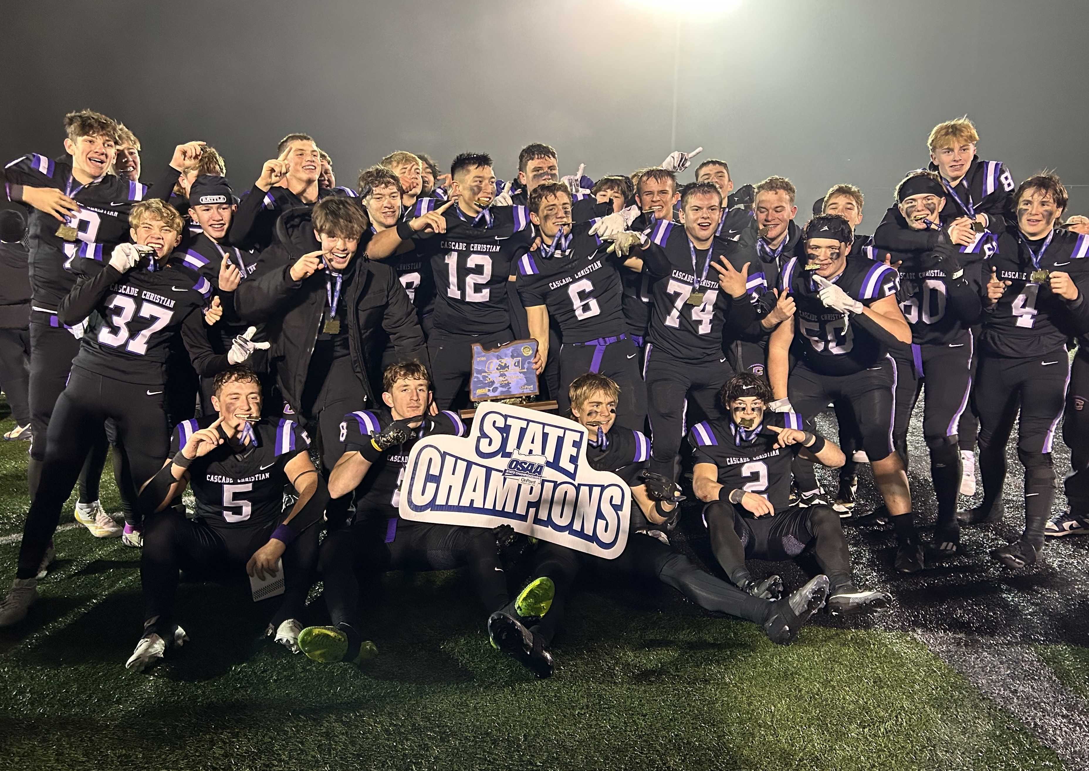 Cascade Christian players celebrate after beating Burns 35-28 in the 3A championship game last season.