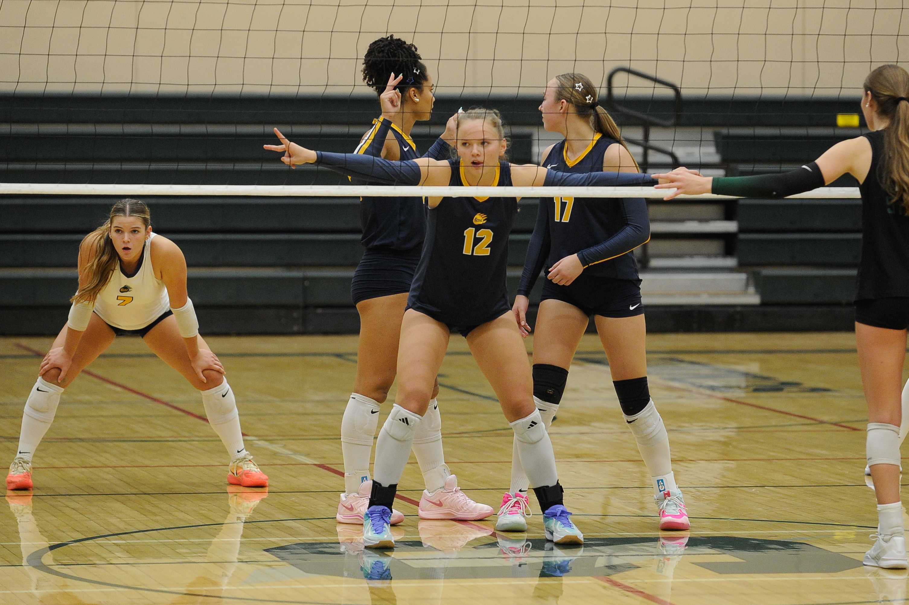 Bend volleyball's Hailey Krueger lines up before a point against Summit. (Photo from Brian Rathbone/Bend Bulletin)