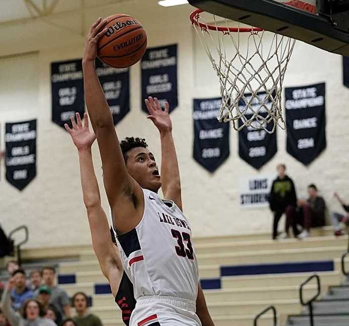 Trace Salton scored 10 of his 14 points in the second half for Lake Oswego. (Photo by Jon Olson)